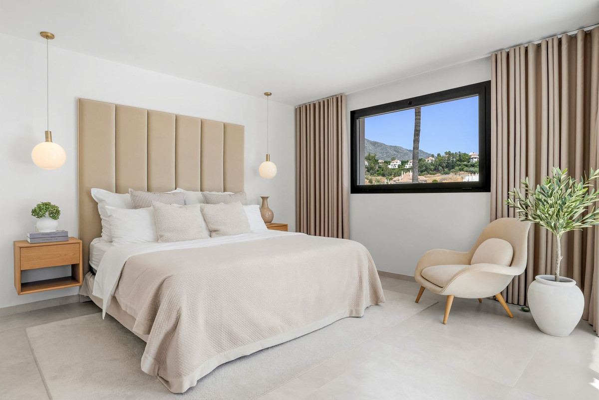 Bedroom with panorama window facing the mountain